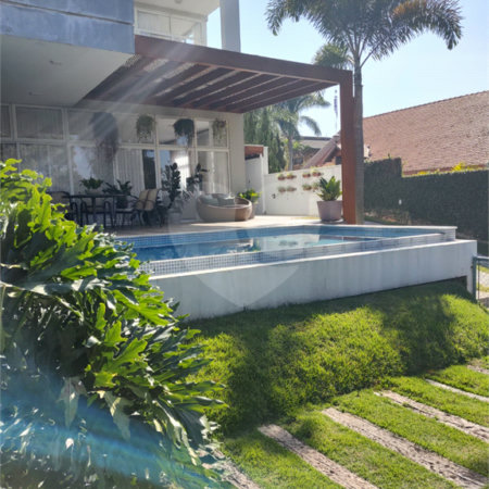 Casa à venda com 4 quartos, sendo 3 suítes, no condomínio Estância Marambaia, Vinhedo - SP