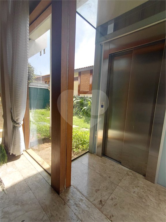 Casa à venda com 4 suítes no condomínio Ville Bourghese, São Paulo - SP