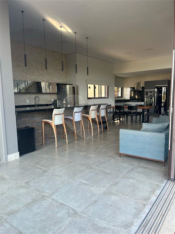 Casa à venda com 4 suítes no condomínio Residencial Campo de Toscana, Vinhedo - SP