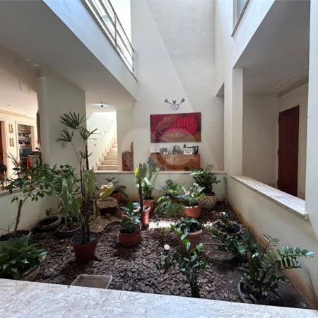 Casa à venda com 5 suítes no condomínio Residencial Bougainville, Campinas - SP