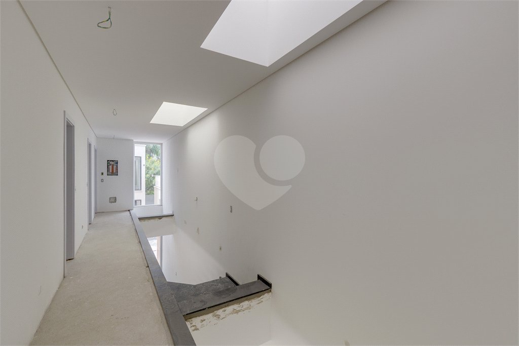 Casa à venda com 4 suítes no condomínio Garda, São Paulo - SP