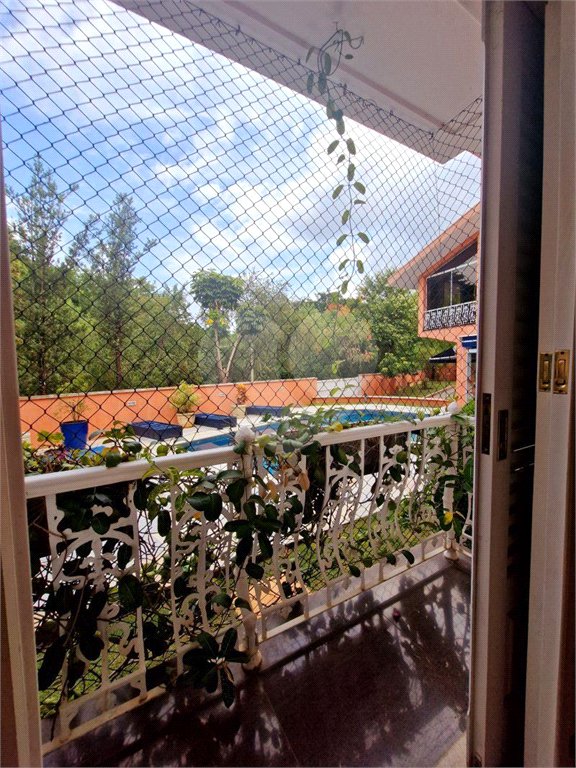 Casa à venda com 4 suítes no condomínio Estância Marambaia, Vinhedo - SP