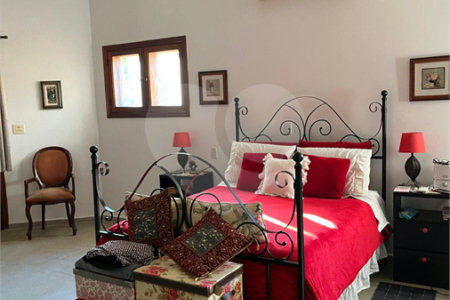 Casa à venda com 4 suítes no condomínio Residencial Vale das Laranjeiras, Indaiatuba - SP