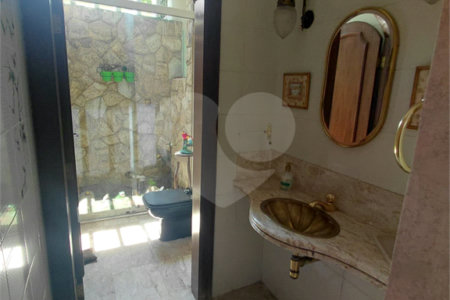 Casa à venda com 4 suítes no condomínio Ville Bourghese, São Paulo - SP