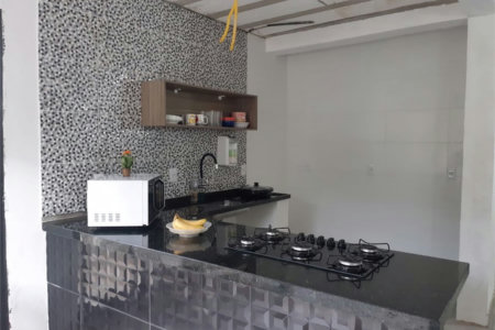 Casa com 4 dormitórios à venda, 180 m² por R$ 650.000,00 - Jardim Virginia - Guarujá/SP