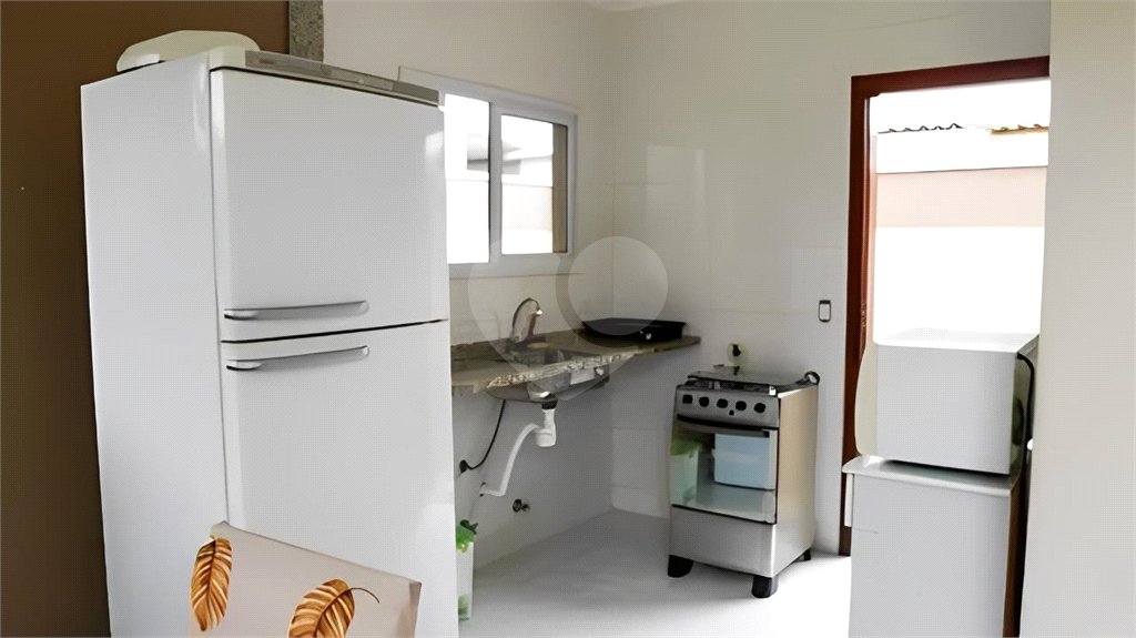 Casa à venda com 3 quartos, sendo 1 suíte, no condomínio Morada da Praia, Bertioga - SP
