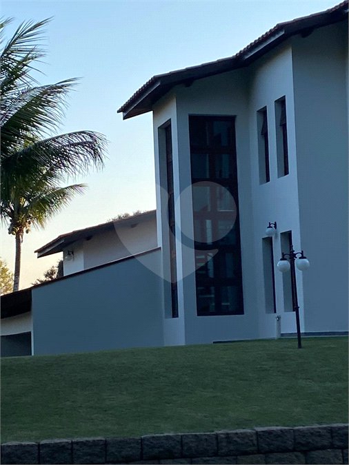 Casa à venda ou para alugar com 4 suítes no condomínio Estância Marambaia, Vinhedo - SP