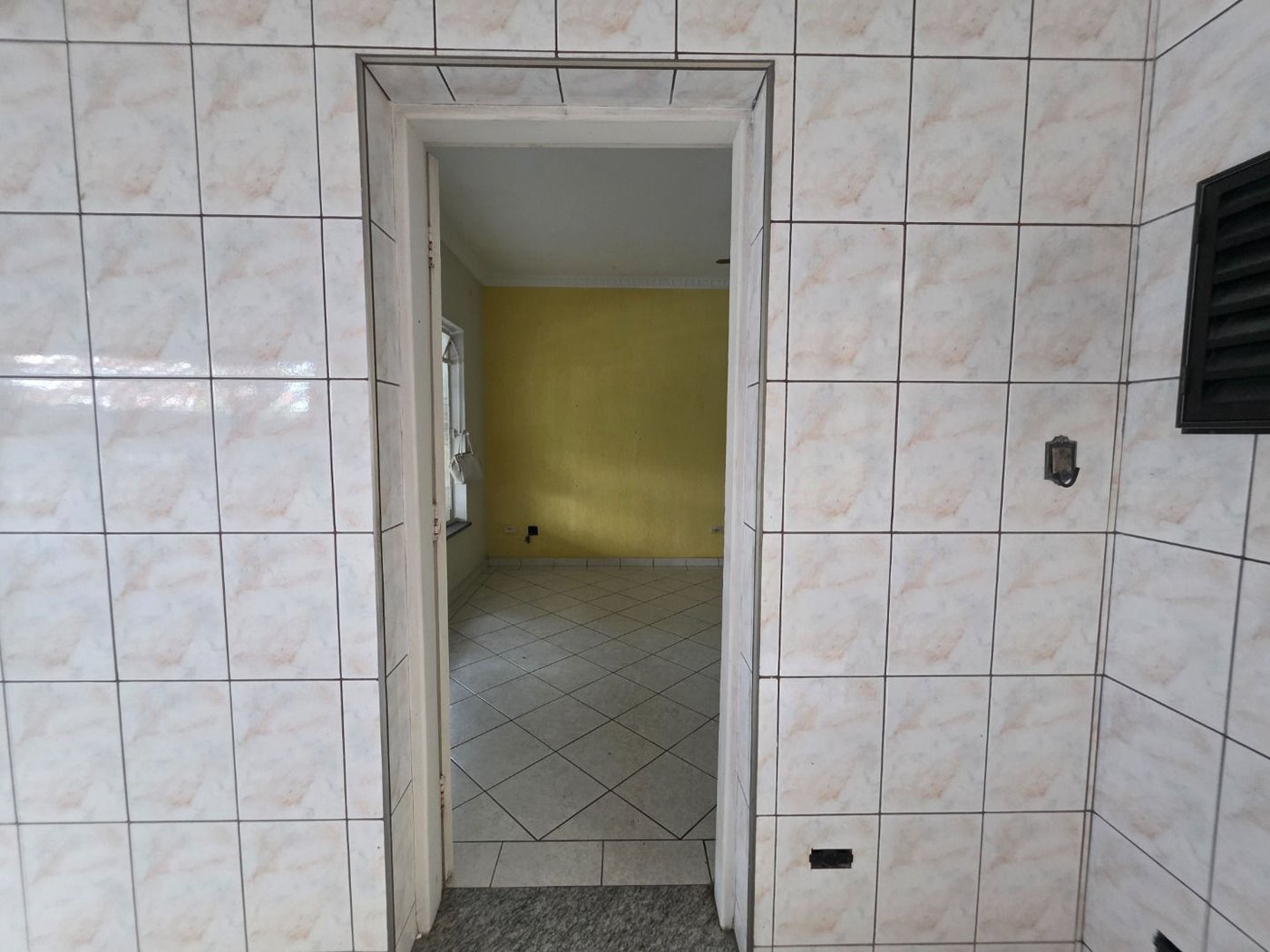 Sobrado com 3 dormitórios à venda, 129 m² por R$ 638.000,00 - Encruzilhada - Santos/SP