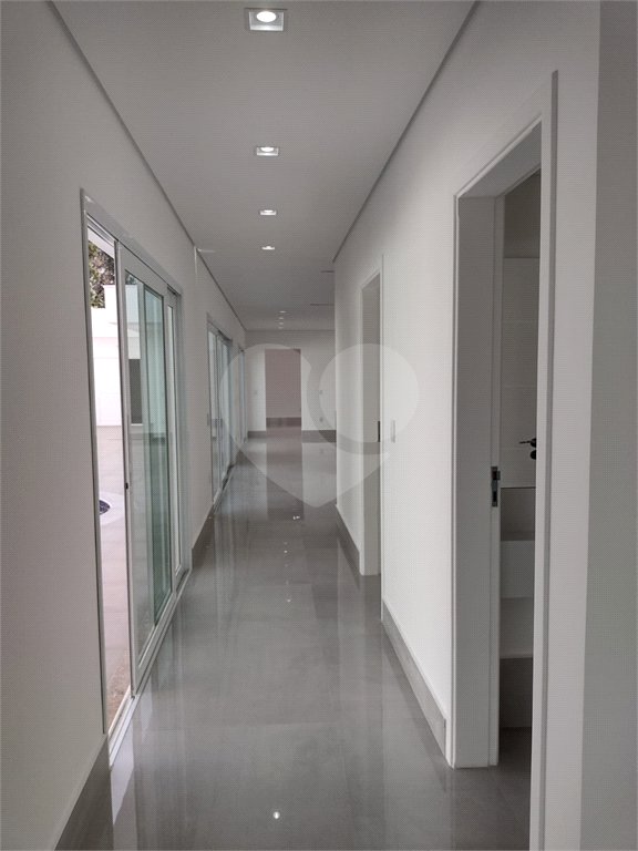 Casa à venda com 4 suítes no condomínio Estância Marambaia, Vinhedo - SP
