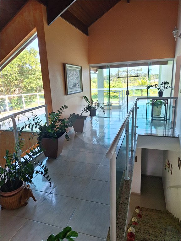 Casa à venda com 4 suítes no condomínio Bougainville, Peruíbe - SP