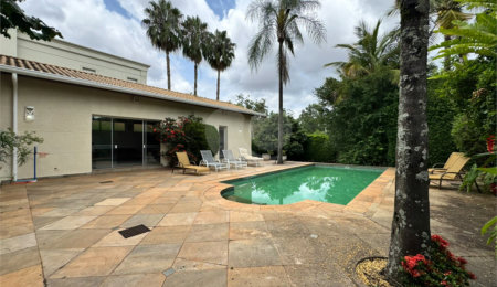 Casa à venda com 5 suítes no condomínio Residencial Bougainville, Campinas - SP