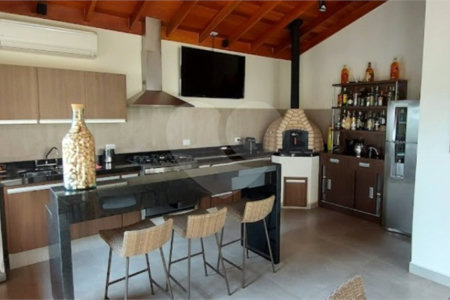 Casa à venda com 4 suítes no condomínio Osato, Atibaia - SP