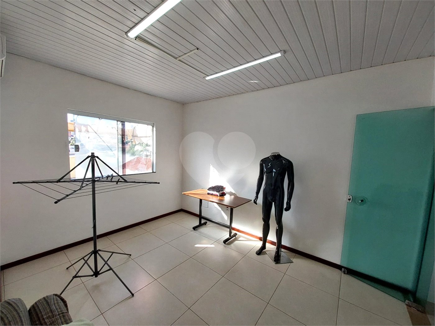 Casa residencial com ponto comercial a venda no Centro
