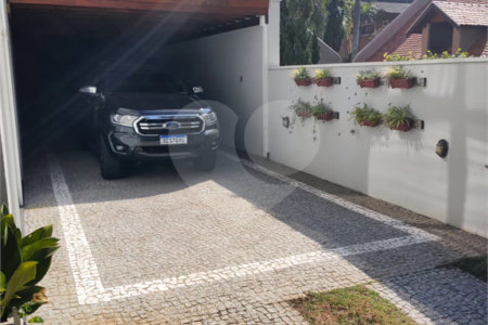 Casa à venda com 4 quartos, sendo 3 suítes, no condomínio Estância Marambaia, Vinhedo - SP