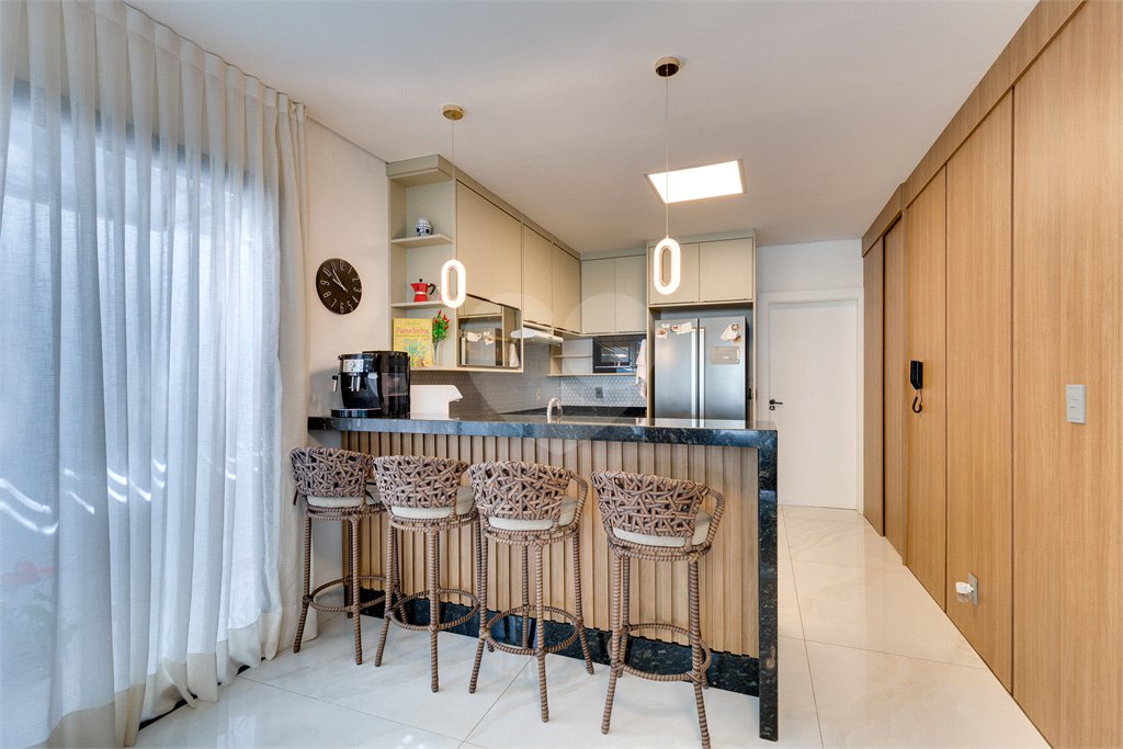 Casa à venda com 4 suítes no condomínio Villa Suiça, São Paulo - SP