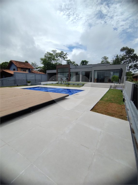 Casa à venda com 4 quartos, sendo 2 suítes, no condomínio Alpes da Cantareira, Mairiporã - SP