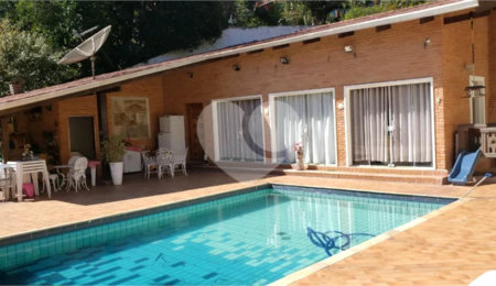 Casa à venda com 4 suítes no condomínio Alpes da Cantareira, Mairiporã - SP