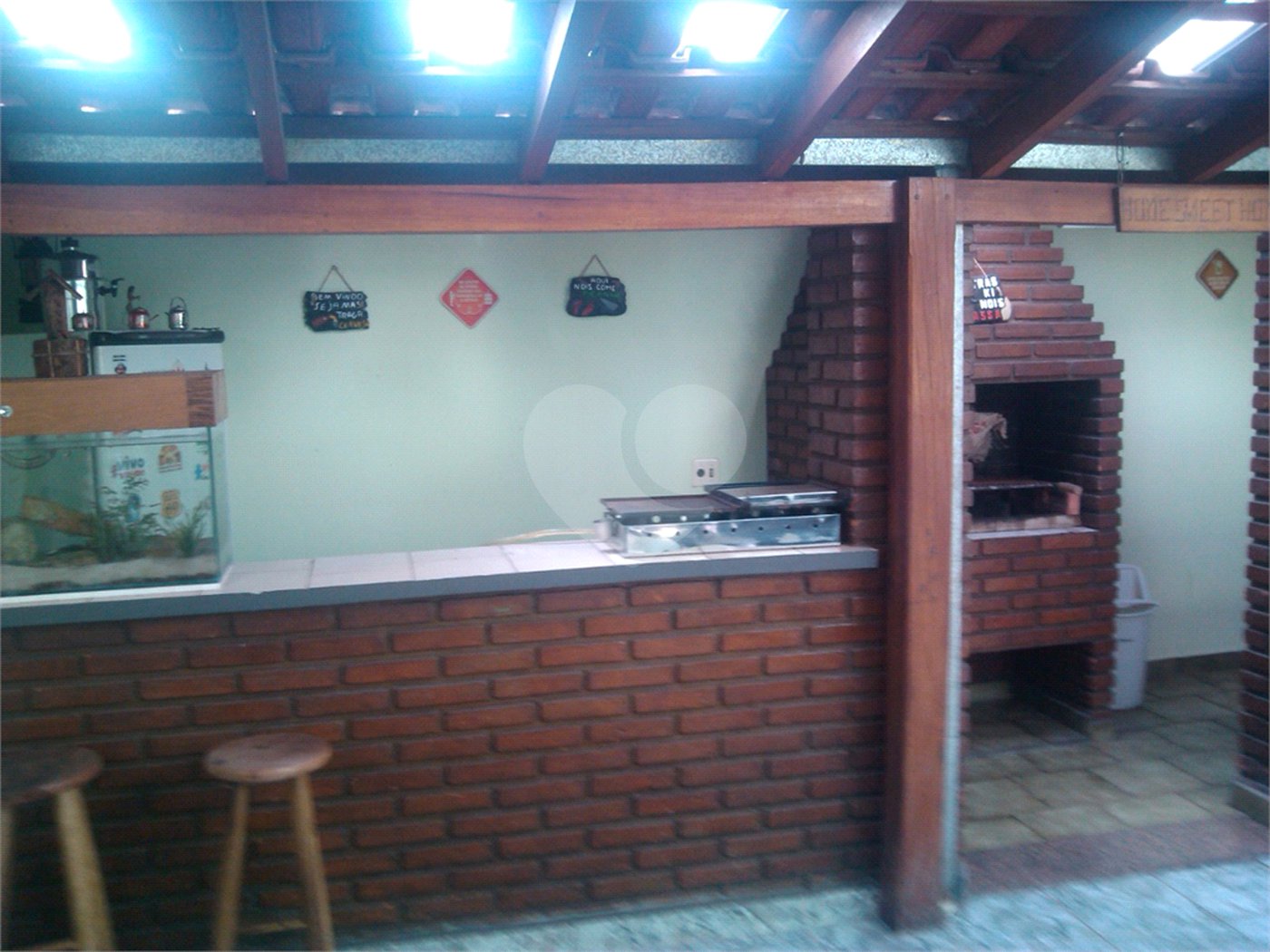 Sobrado com salão comercial na Sallum.