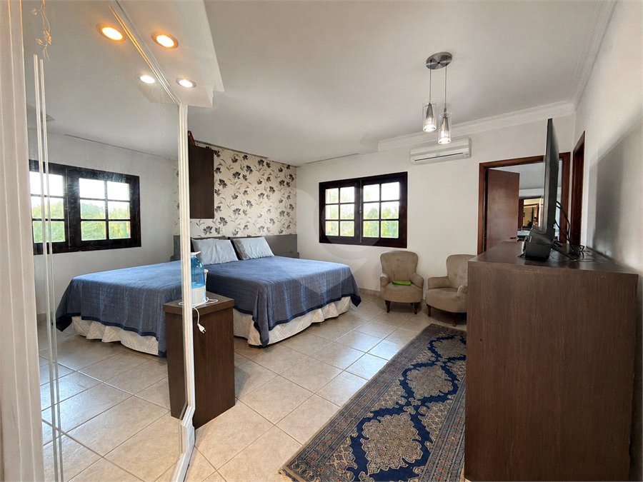 Casa à venda com 5 suítes no condomínio Parque Village Castelo, Itu - SP