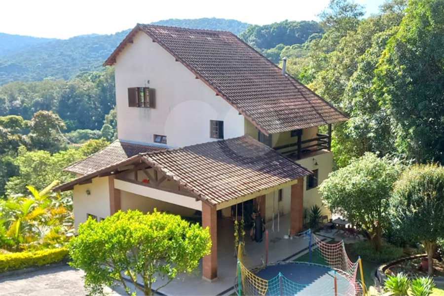Casa à venda com 4 suítes no condomínio Alpes da Cantareira, Mairiporã - SP
