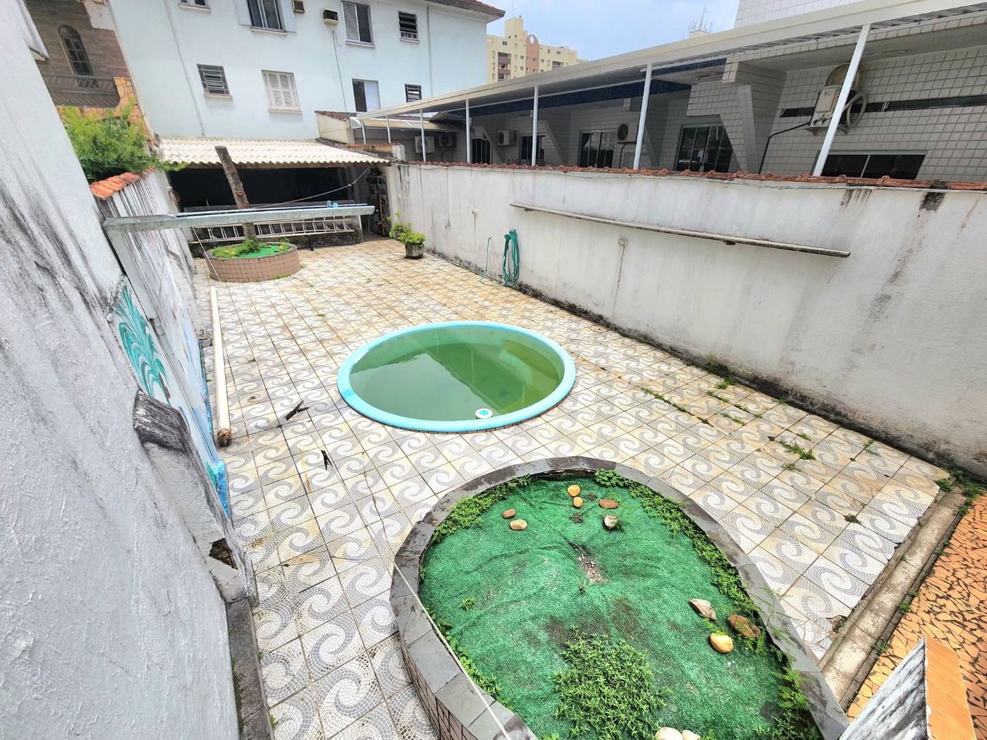 Casa com 3 dormitórios à venda, 198 m² por R$ 1.099.000,00 - Marapé - Santos/SP