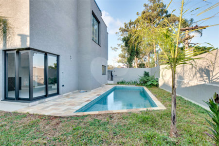 Casa à venda com 4 suítes no condomínio Reserva Robélia, São Paulo - SP