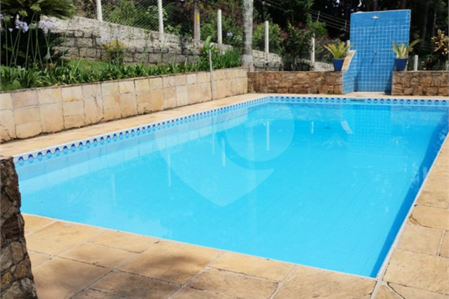 Casa à venda com 4 quartos, sendo 2 suítes,  no condomínio Cinco Lagos, Mairiporã - SP