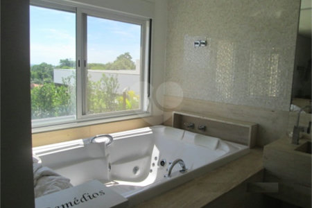Casa à venda com 6 suítes no condomínio Jardim Primavera, Louveira - SP