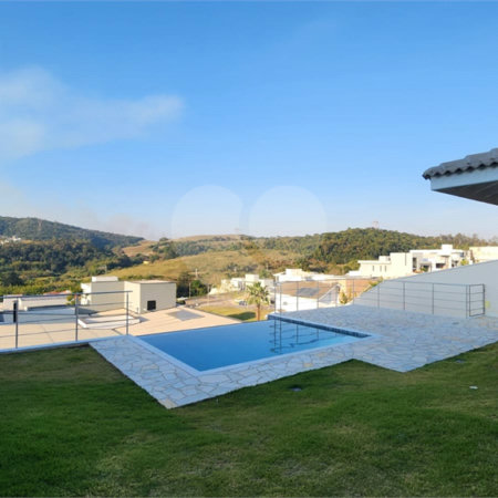 Casa à venda com 4 suítes no condomínio Santa Isabel I, Louveira - SP