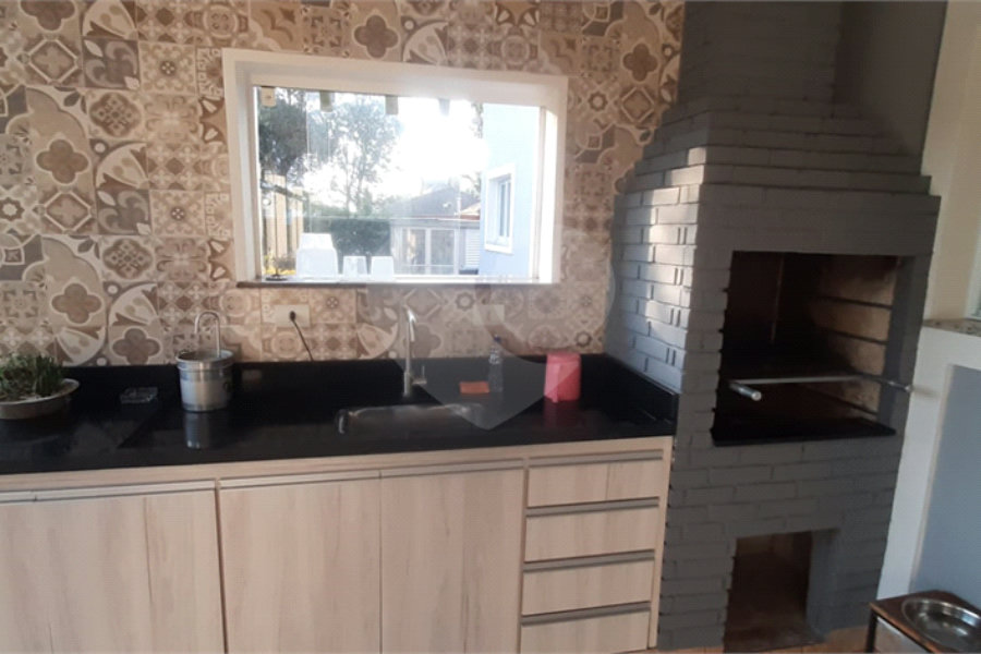 Casa à venda com 4 suítes no condomínio Suíça da Cantareira, Mairiporã - SP