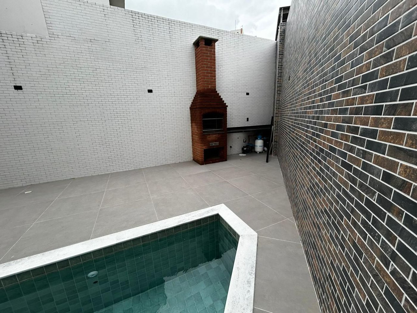 Casa com 3 dormitórios à venda, 100 m² por R$ 1.380.000,00 - Aparecida - Santos/SP