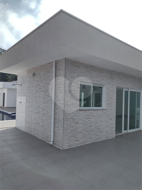 Casa à venda com 4 suítes no condomínio Estância Marambaia, Vinhedo - SP