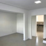 Casa com 3 dormitórios à venda, 116 m² por R$ 690.000,00 - Gonzaga - Santos/SP