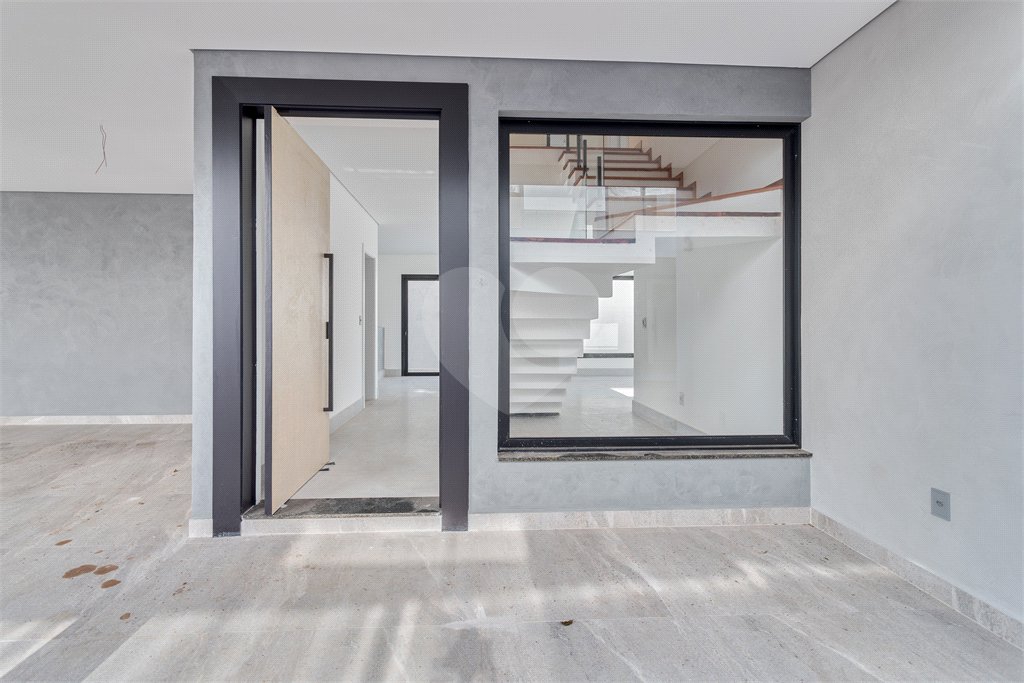 Casa à venda com 4 suítes no condomínio Villa Suiça, São Paulo - SP