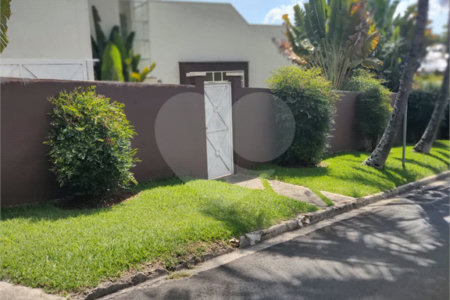 Casa à venda com 4 suítes no condomínio Estância Marambaia, Vinhedo - SP