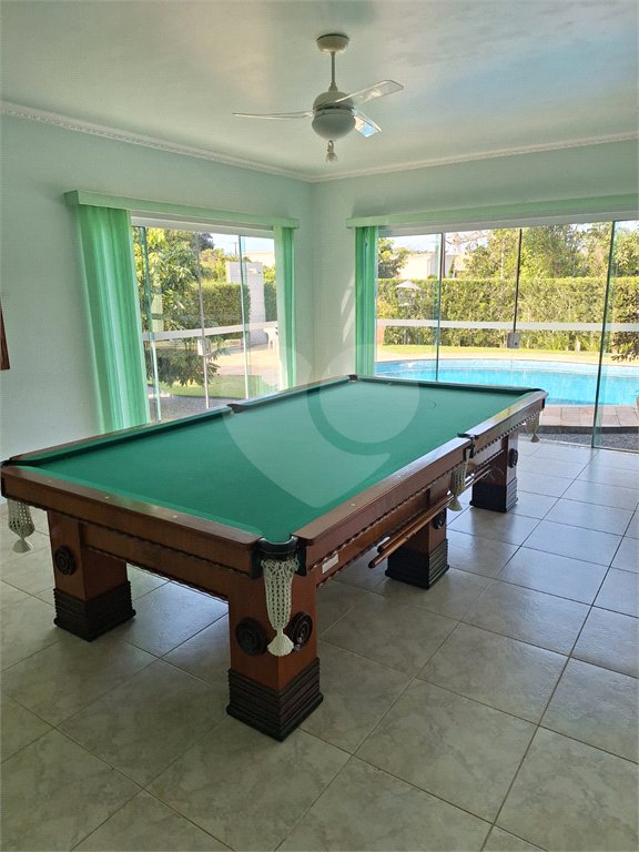 Casa à venda com 4 suítes no condomínio Bougainville, Peruíbe - SP