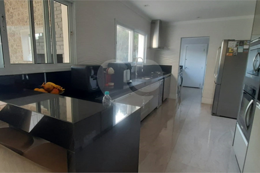 Casa à venda com 4 suítes no condomínio Suíça da Cantareira, Mairiporã - SP