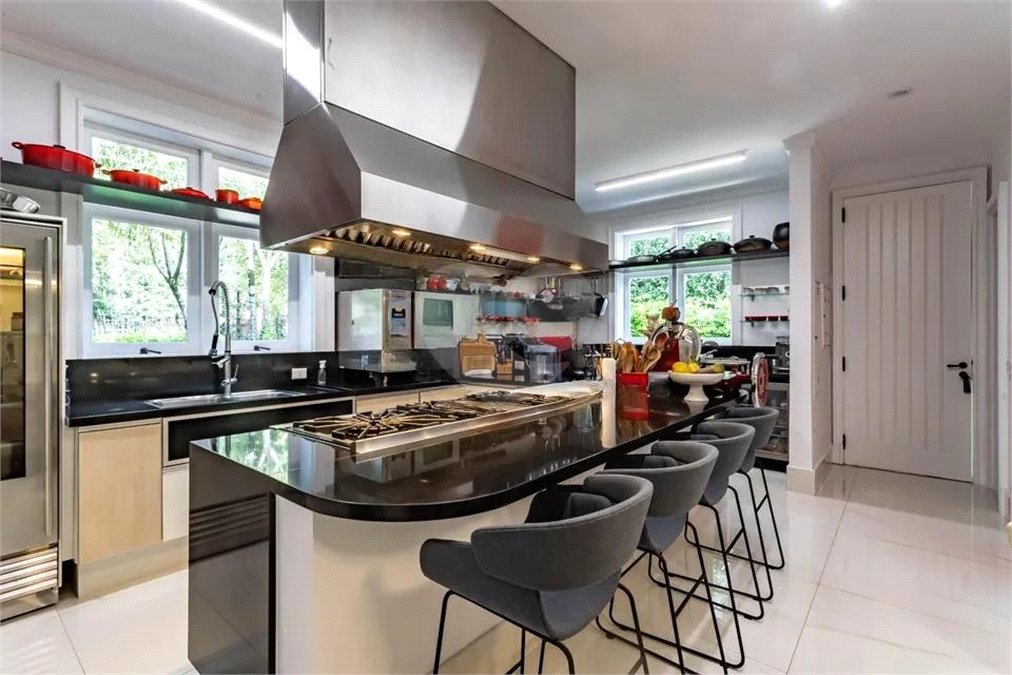 Casa à venda com 4 suítes no condomínio Ville D´asolo, São Paulo - SP