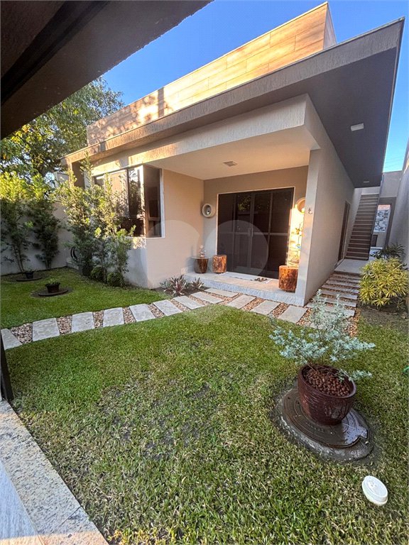 Casa à venda com 3 quartos, sendo 2 suítes, no condomínio Recanto das Palmeiras, Rio de Janeiro - RJ