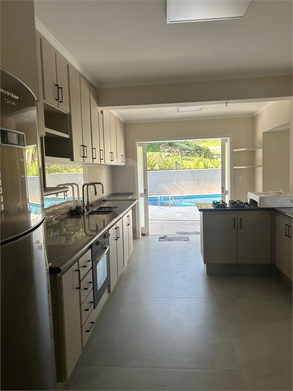 Casa à venda com 4 suítes no condomínio Jardim Paulista I, Vinhedo - SP