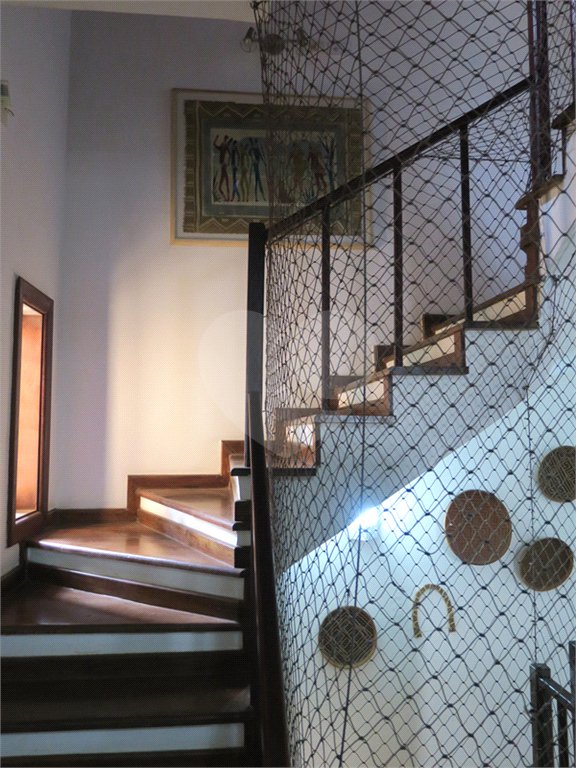 Casa à venda com 4 quartos, sendo 2 suítes, no condomínio Vila das Flores, São Paulo - SP