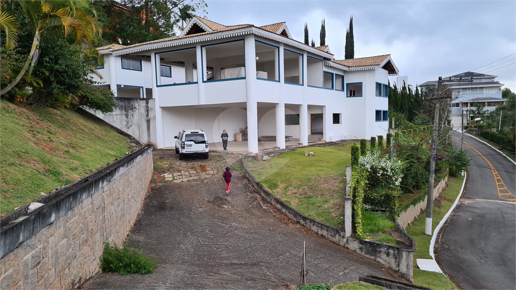 Casa à venda com 4 suítes no condomínio Suíça da Cantareira, Mairiporã - SP