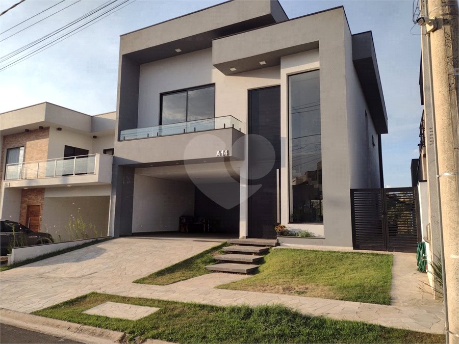 Casa à venda com 4 suítes no condomínio Residencial Villa do Sol, Valinhos - SP
