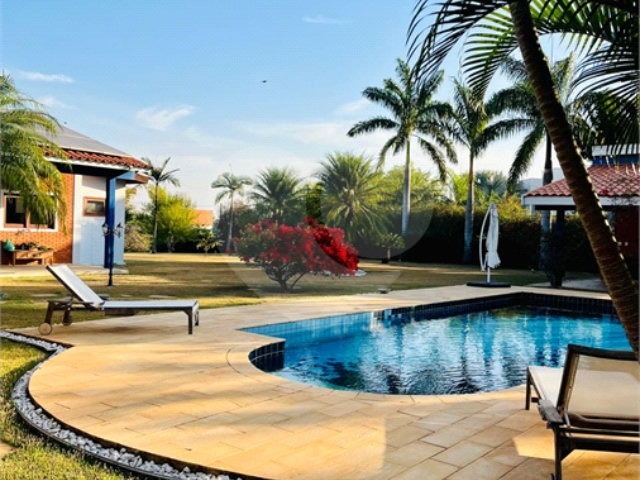 Casa à venda com 4 suítes no condomínio Residencial Vale das Laranjeiras, Indaiatuba - SP