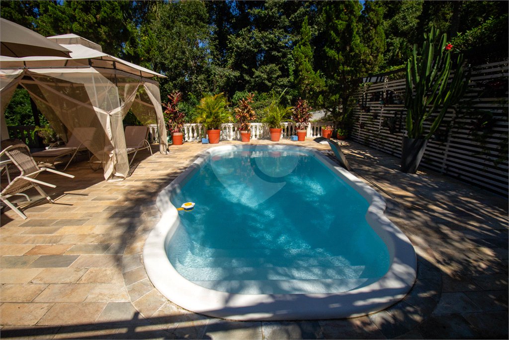 Casa à venda com 4 suítes no condomínio Sítio Primavera, São Roque - SP