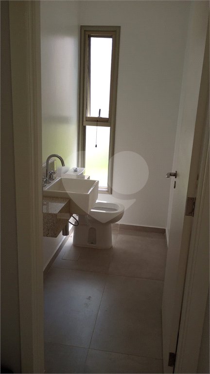 Casa à venda com 4 suítes no condomínio Estância Marambaia, Vinhedo - SP