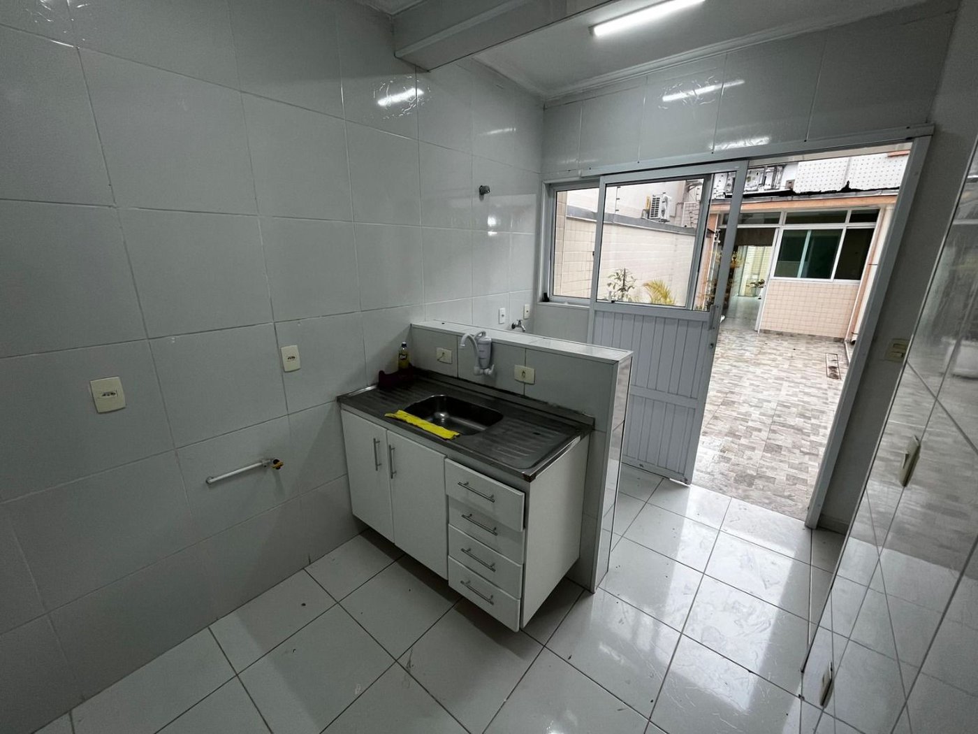 Sobrado com 3 dormitórios à venda, 152 m² por R$ 1.700.000,00 - Embaré - Santos/SP