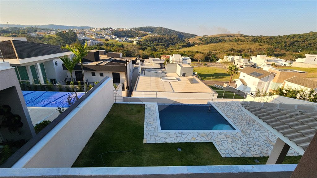 Casa à venda com 4 suítes no condomínio Santa Isabel I, Louveira - SP