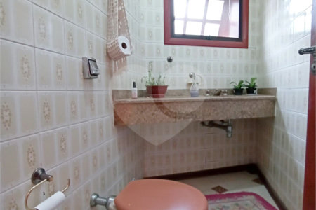 Casa à venda com 4 suítes no condomínio Estância Marambaia, Vinhedo - SP