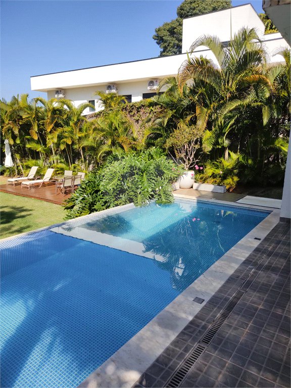 Casa à venda com 4 quartos, sendo 3 suítes, no condomínio Estância Marambaia, Vinhedo - SP